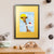 A young white boy with blonde hair sits on a cloud that brings him up to a giraffe's face (A3 framed with gold mount)
