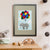 A grey elephant tied to a bunch of colourful balloons flies high among the clouds (A3 framed with grey mount)