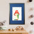 A green caterpillar shelters from the rain under a vibrant red mushroom (A3 framed with blue mount)