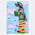 A grey bunny with red glasses reads a book called 'Up the rabbit hole' while sitting on a pile of books so high that he's in the clouds among the birds (print only)